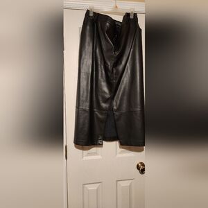LEATHER SKIRT WITH FRONT POCKETS, FRONT SPLIT, BELT LOOPS AND BACK POCKETS